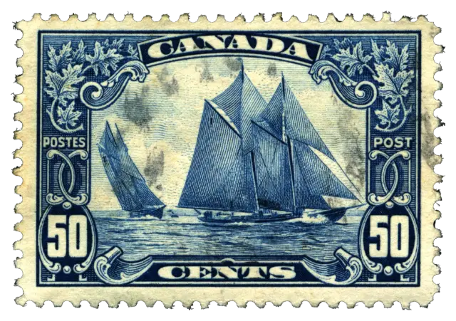 A two-masted racing schooner under full sail; stamp issued by Dominion of Canada, 1929